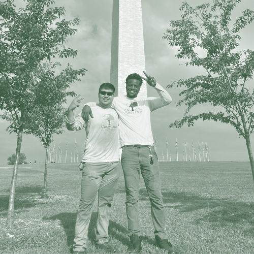 staff members in front of the Washington monument