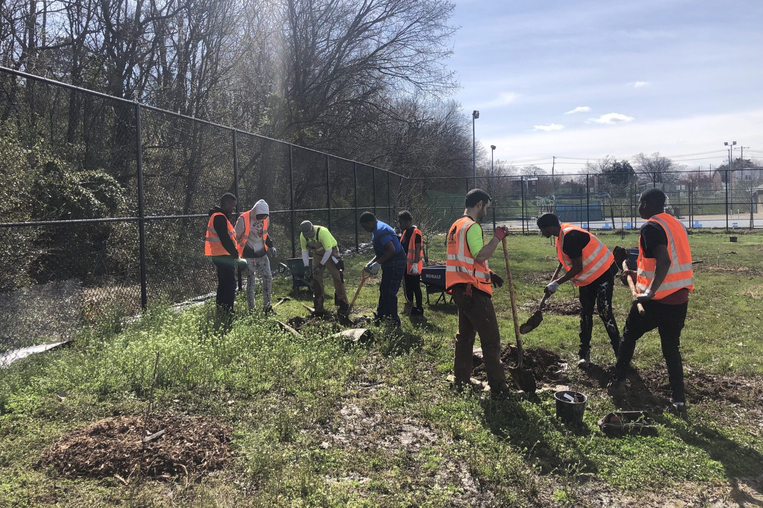 CT crew planting with Volunteers.