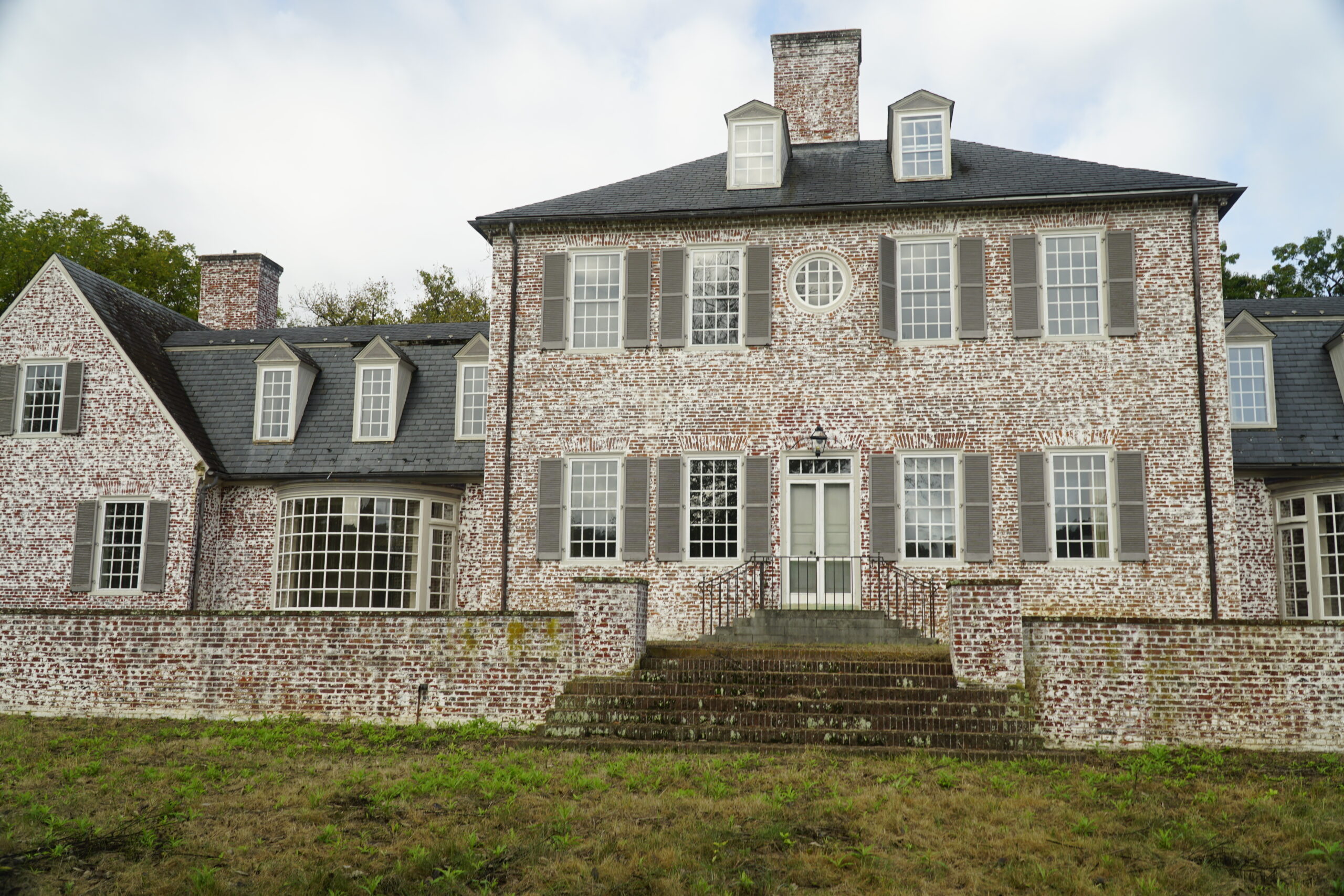 A brick home with wall