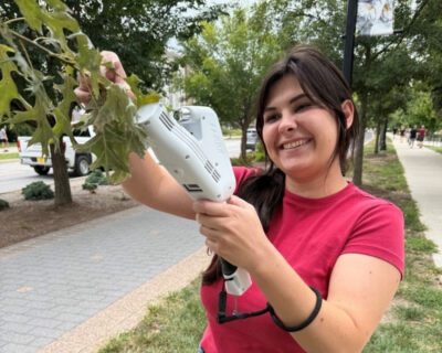 GCA Scholar Mary-Margaret takes spectral images of a tree's leaves for her research.