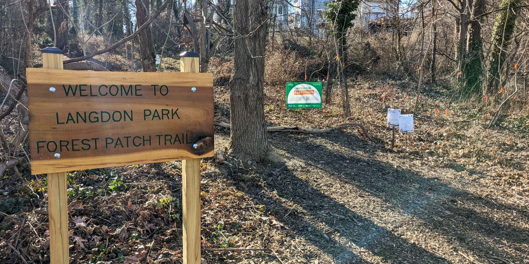 Langdon Forest Patch with a sign that says "Welcome to the Langdon Park Forest Patch Trail."