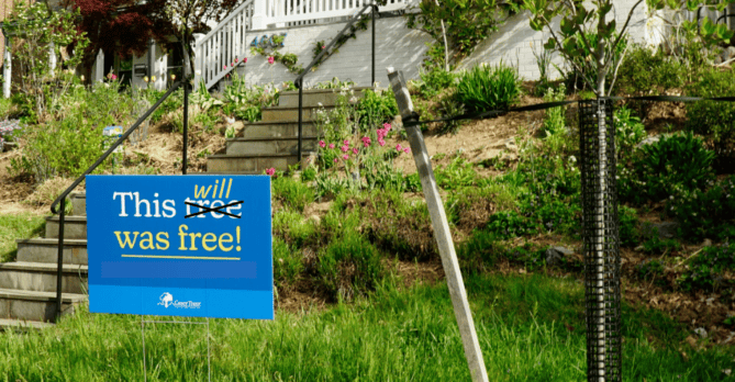 A yard sign says 
